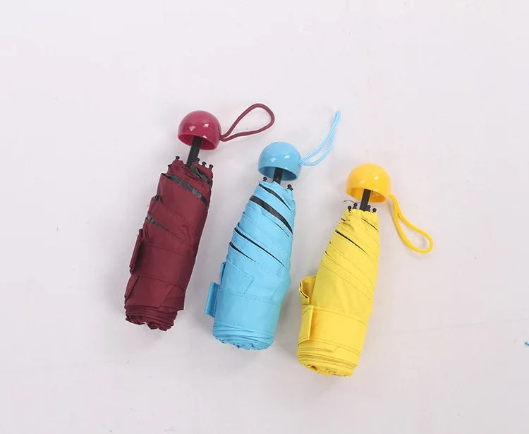 Wholesale Custom Mini Umbrella Manual Capsule Uv Protection Small Folding Umbrella Sun and Rain